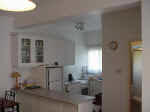 There is an open plan kitchen and dining room.