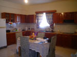 Double house for sale in Larnaca, Cyprus has a spacious kitchen.
