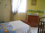 This is the second bedroom used by the children of the family.